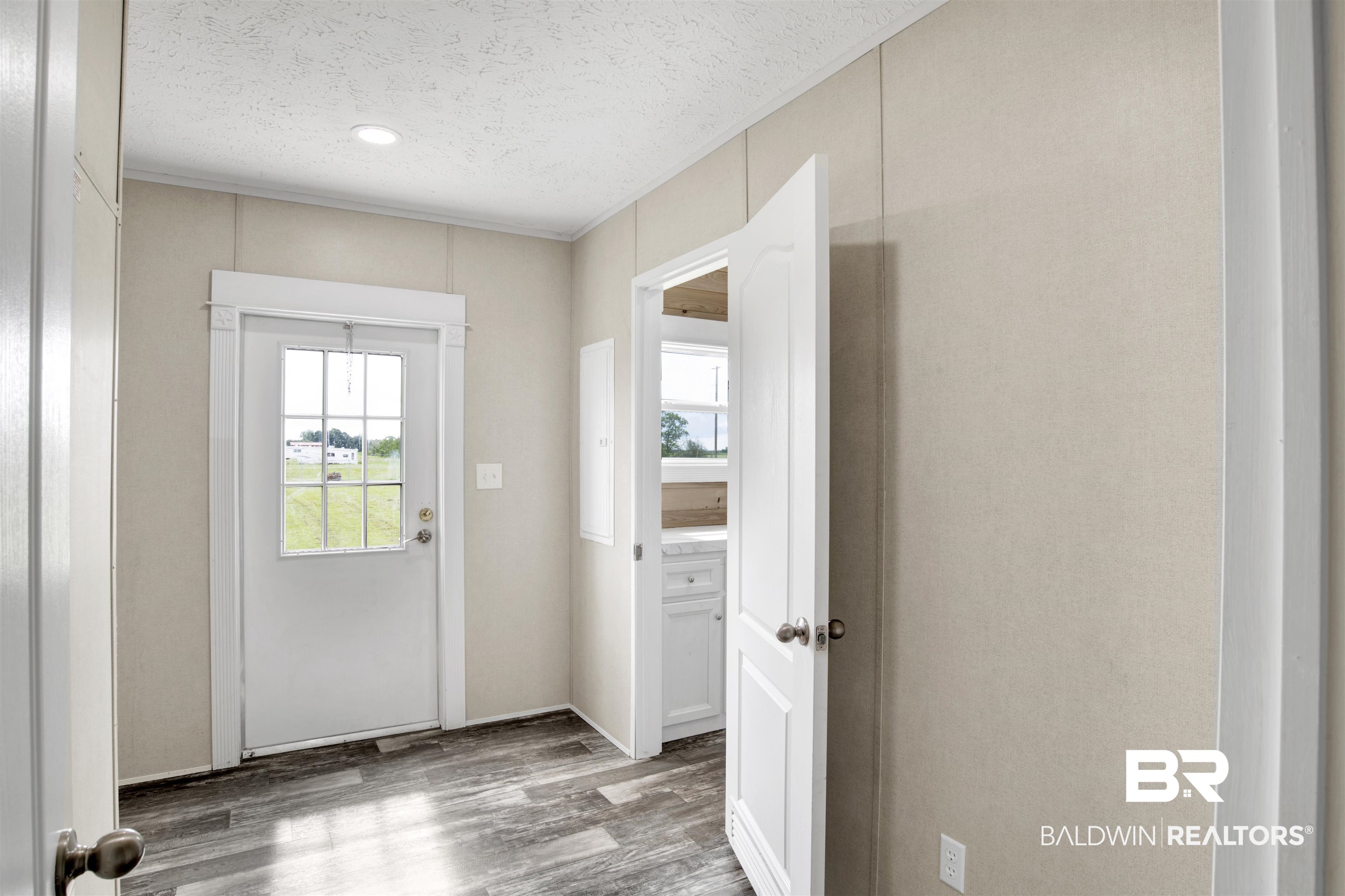 16778 County Road 87 Elberta, AL 36530 - Photo 9 of 32 Entryway featuring a textured ceiling and hardwood / wood-style floors