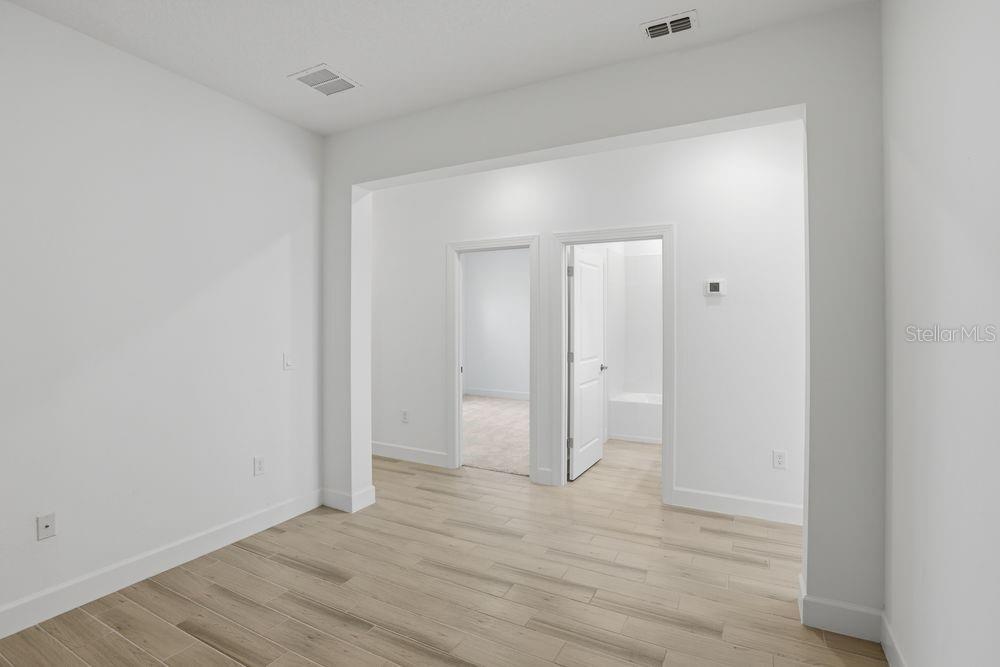 5375 Spoonflower Court St. Cloud, FL 34771 - Photo 15 of 42 a view of an empty room