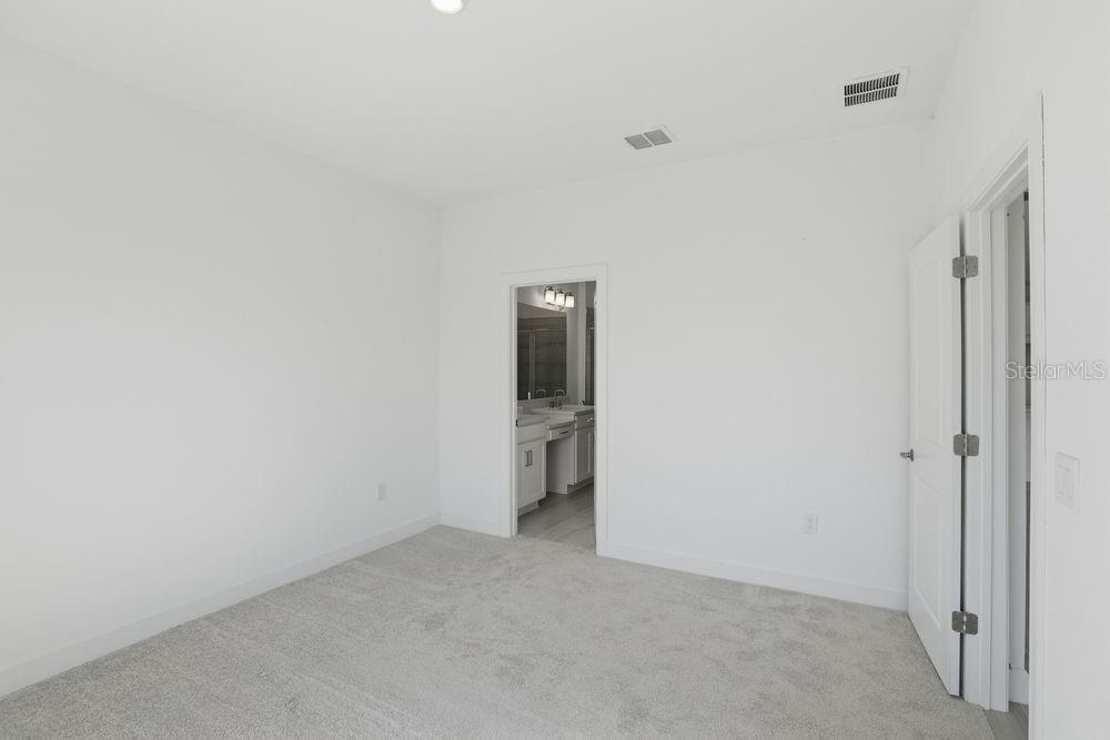 5375 Spoonflower Court St. Cloud, FL 34771 - Photo 19 of 42 a view of an empty room
