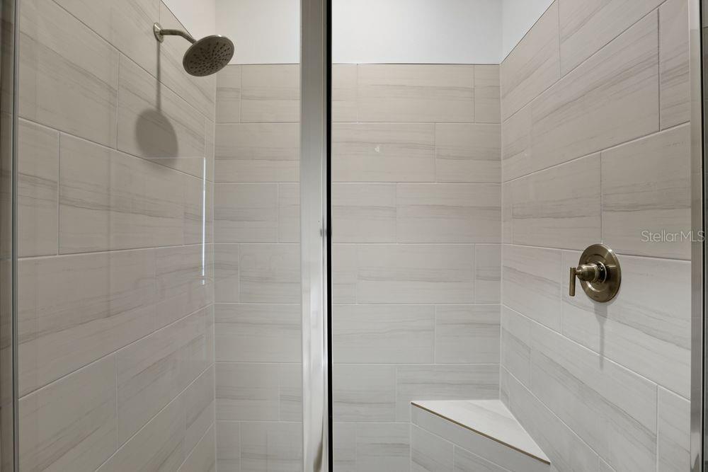 5375 Spoonflower Court St. Cloud, FL 34771 - Photo 21 of 42 a bathroom with a shower