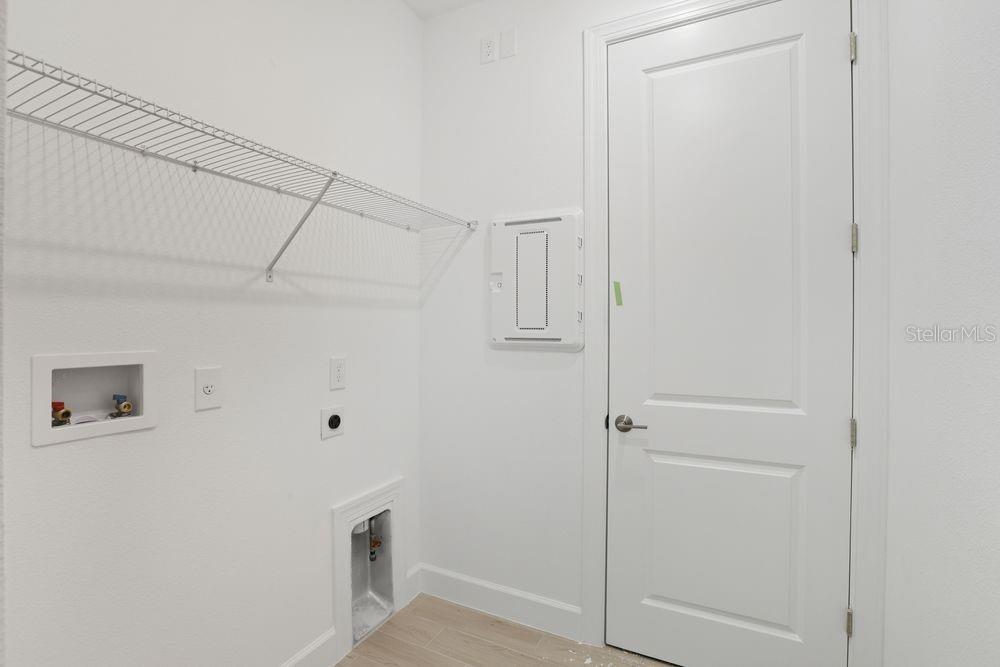 5375 Spoonflower Court St. Cloud, FL 34771 - Photo 27 of 42 a view of a livingroom with an empty space