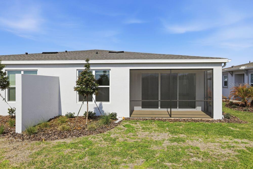 5375 Spoonflower Court St. Cloud, FL 34771 - Photo 29 of 42 front view of house with a yard