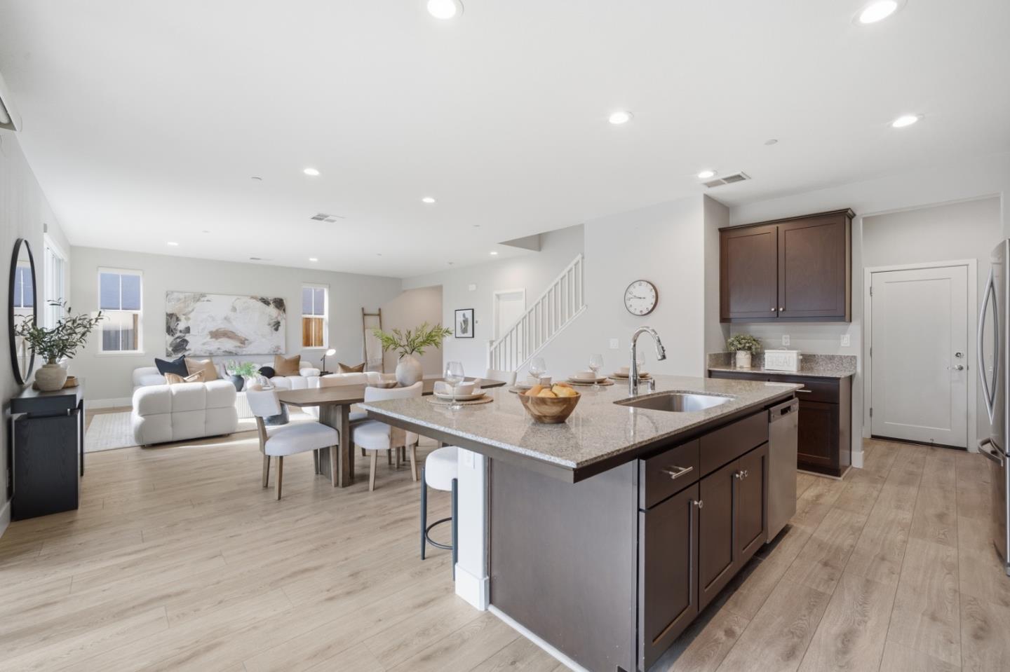 6430 Godani Street Gilroy, CA 95020 - Photo 14 of 38 a view of a kitchen counter space and living room