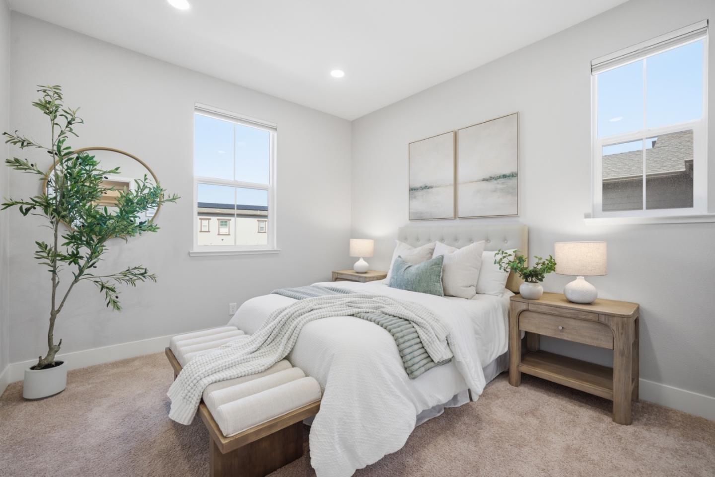 6430 Godani Street Gilroy, CA 95020 - Photo 21 of 38 a bedroom with bed and a potted plant
