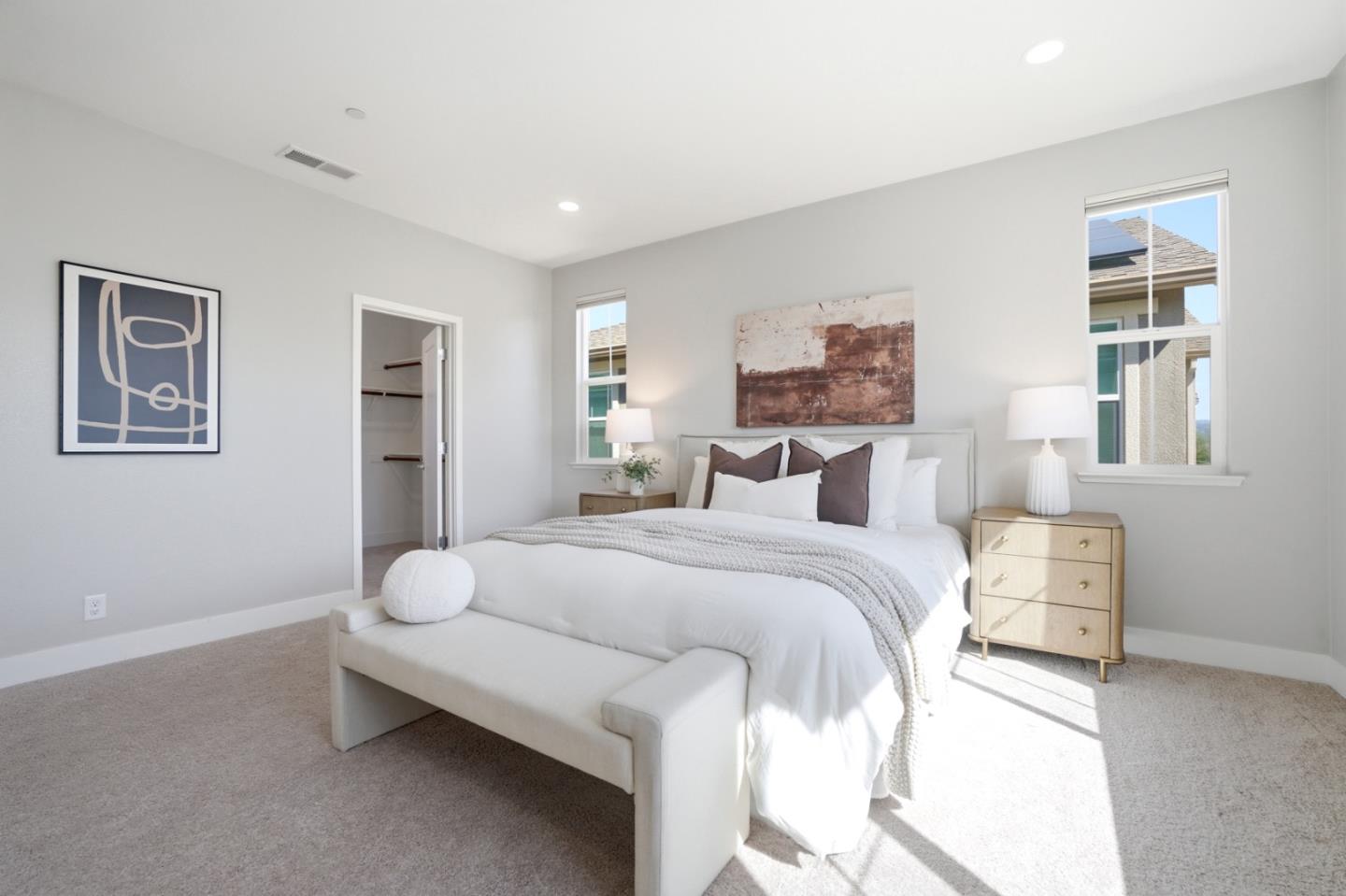 6430 Godani Street Gilroy, CA 95020 - Photo 26 of 38 a spacious bedroom with a bed and a painting on the wall