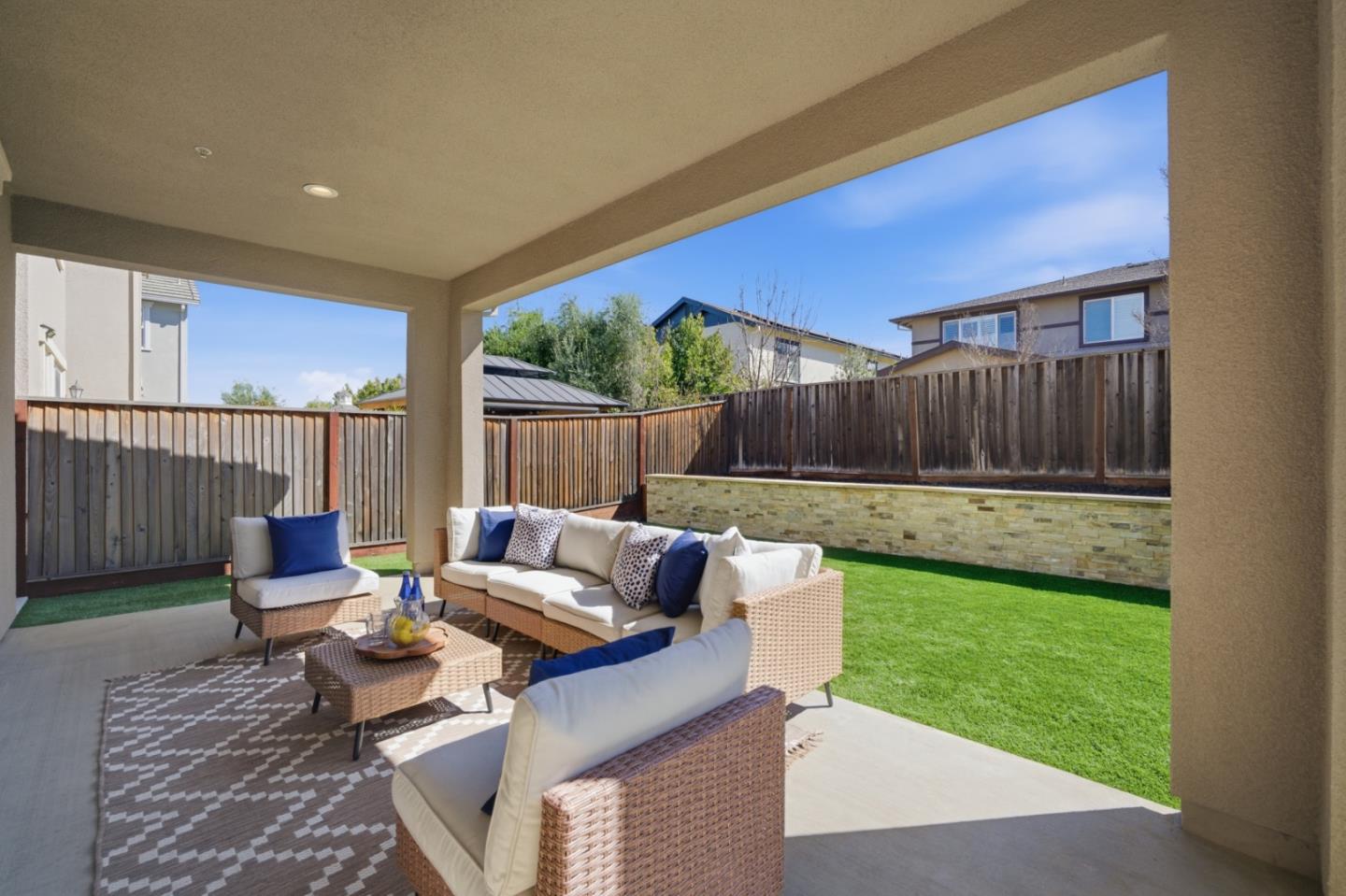 6430 Godani Street Gilroy, CA 95020 - Photo 29 of 38 a outdoor space with patio couch and a garden