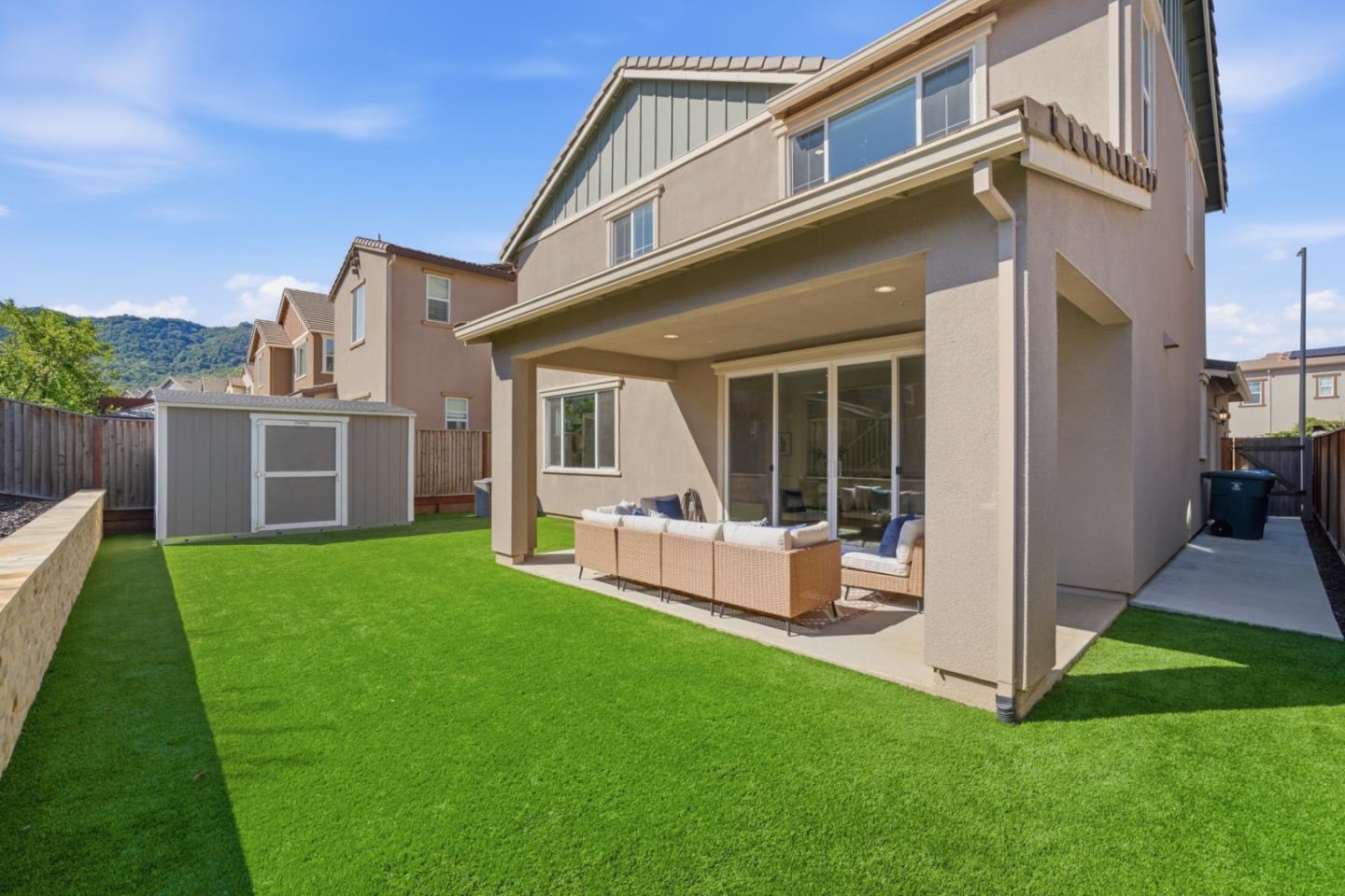 6430 Godani Street Gilroy, CA 95020 - Photo 31 of 38 a view of a house with backyard and porch