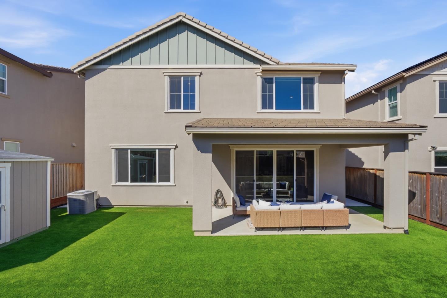 6430 Godani Street Gilroy, CA 95020 - Photo 33 of 38 a view of a house with a yard and a large window