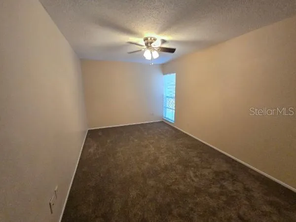 a view of a small space with a fan