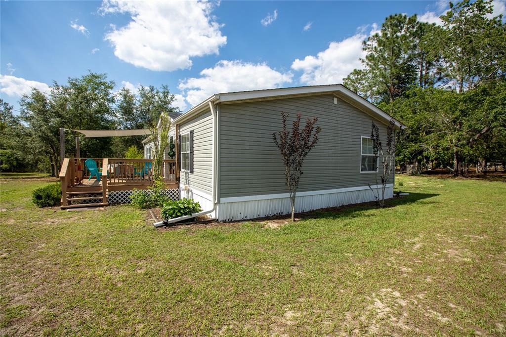 5670 Acadia Street Keystone Heights, FL 32656 - Photo 7 of 65 a view of back yard of the house
