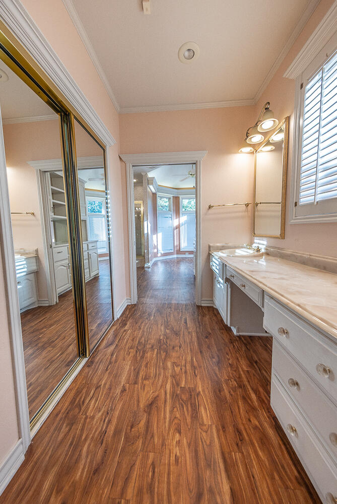 6604 3rd Street Lubbock, TX 79416 - Photo 17 of 46 a view of a kitchen from the hallway