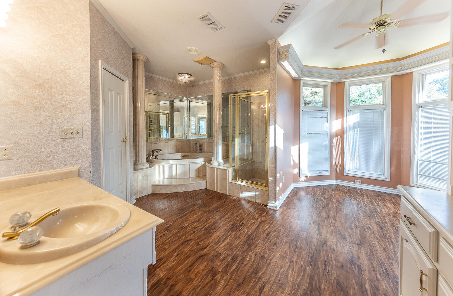 6604 3rd Street Lubbock, TX 79416 - Photo 18 of 46 a bathroom with a sink and a mirror