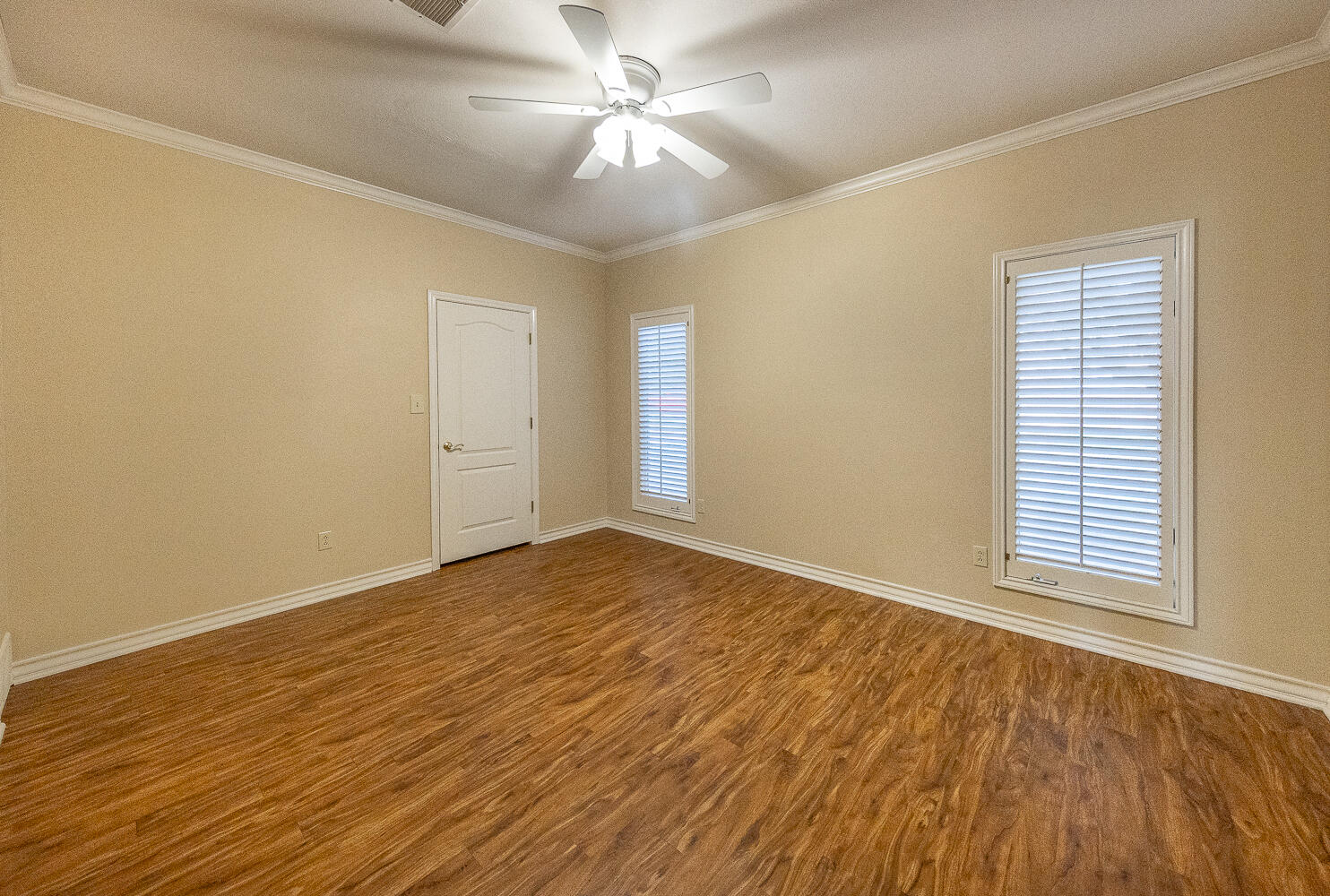 6604 3rd Street Lubbock, TX 79416 - Photo 20 of 46 wooden floor in an empty room with a window