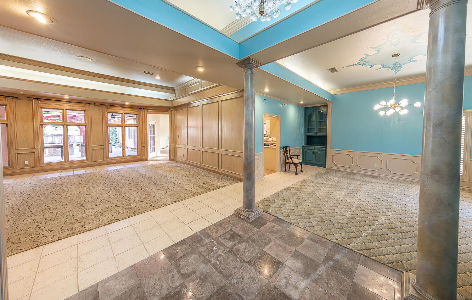 6604 3rd Street Lubbock, TX 79416 - Photo 3 of 46 a spacious bathroom with a granite countertop sink and a mirror