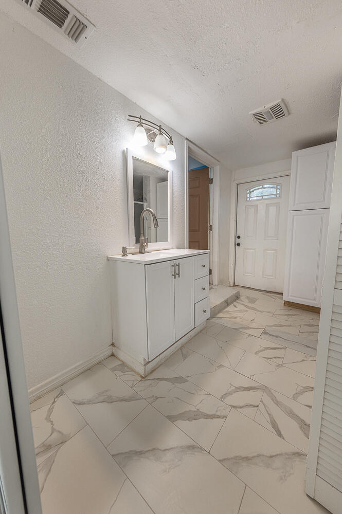 6604 3rd Street Lubbock, TX 79416 - Photo 41 of 46 a view of a storage & utility room in a house