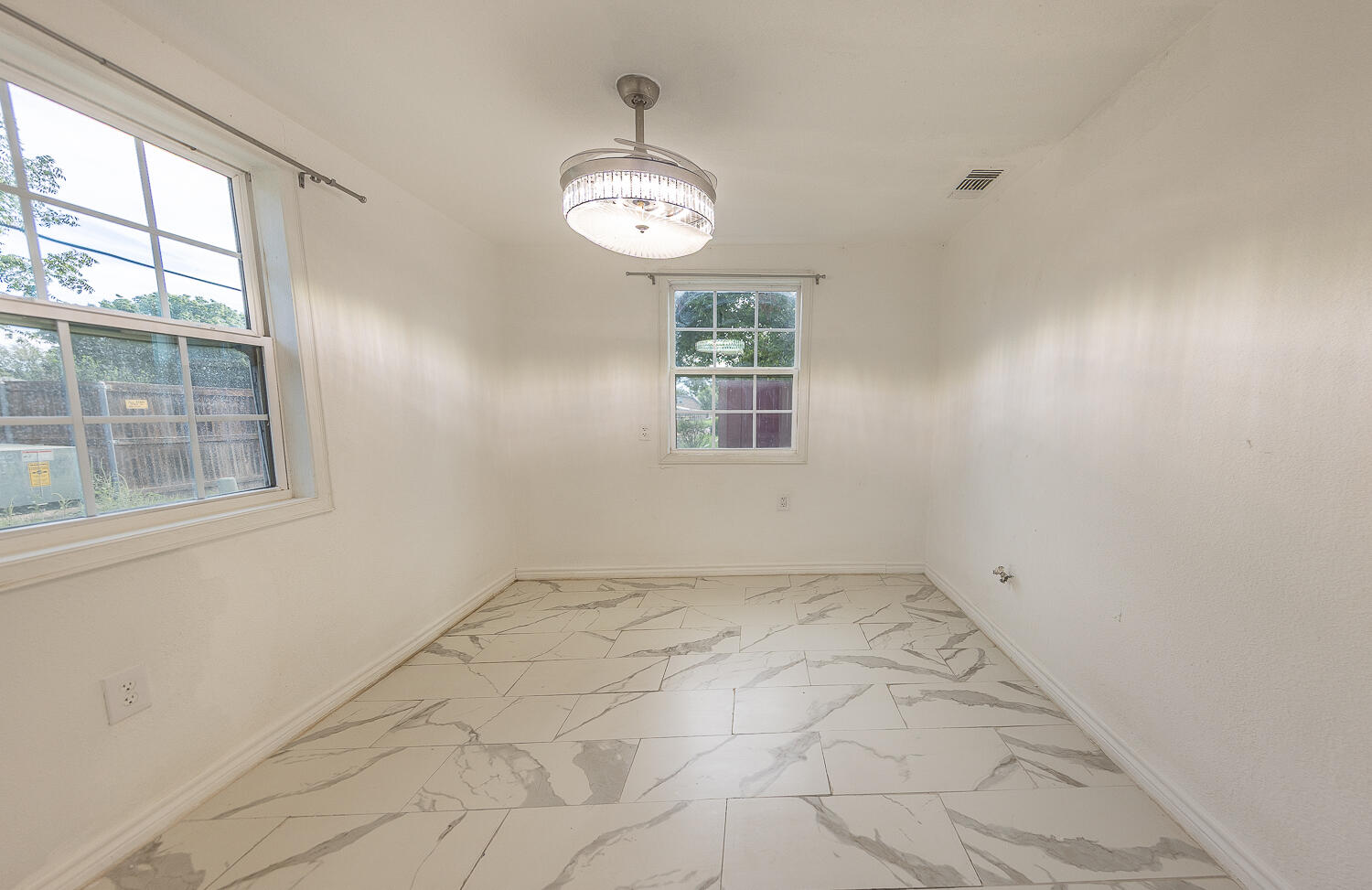 6604 3rd Street Lubbock, TX 79416 - Photo 42 of 46 an empty room with windows