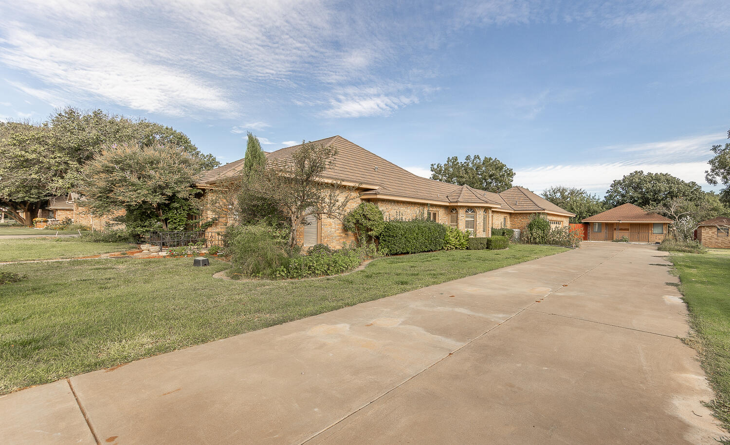 6604 3rd Street Lubbock, TX 79416 - Photo 45 of 46 a view of a house with a yard