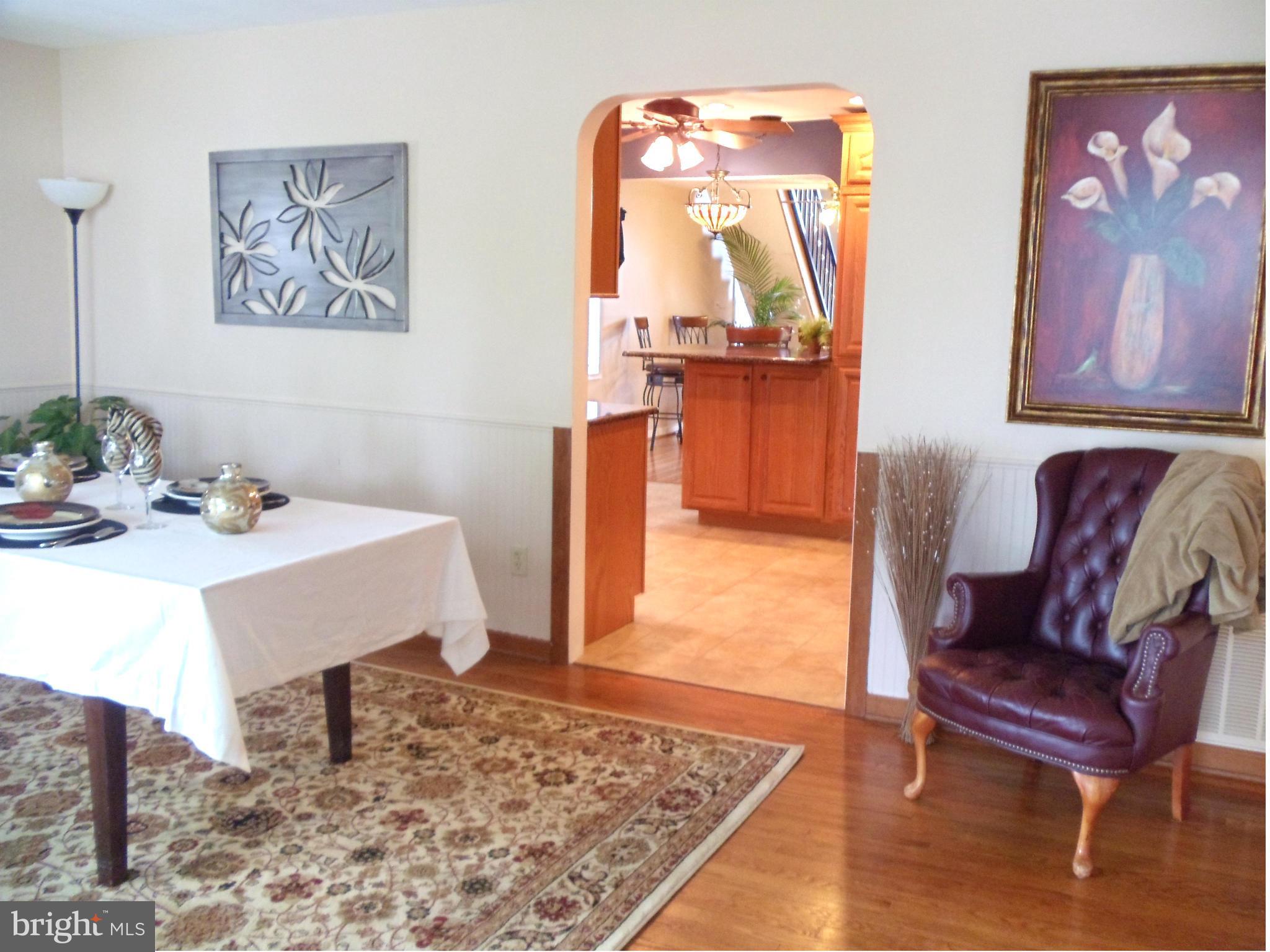 180 Chelsea Road Pasadena, MD 21122 - Photo 7 of 30 Huge Dining Rm w/hardwood & plenty of sunshine!