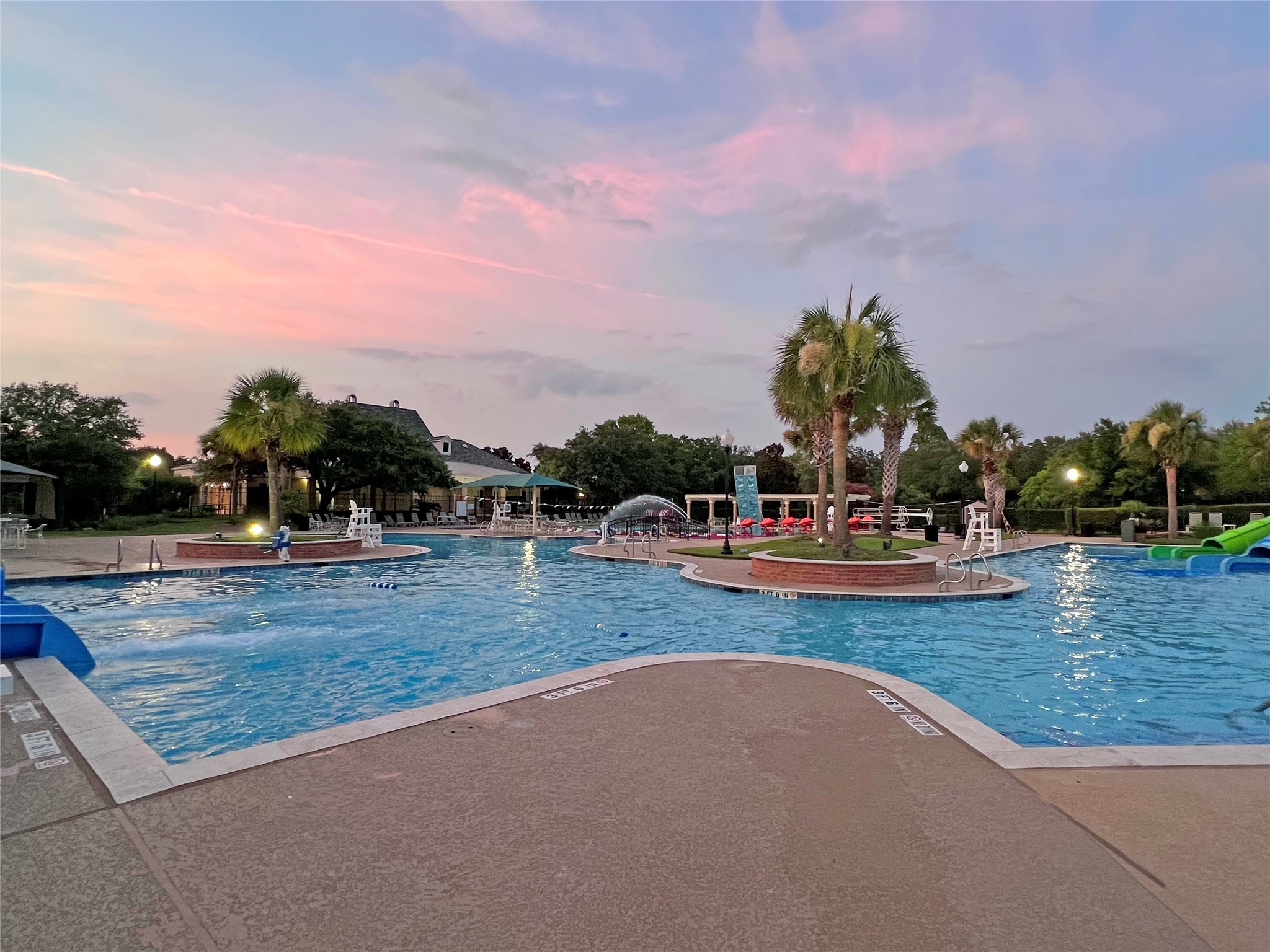 9603 Randon Lane Missouri City, TX 77459 - Photo 47 of 50 Sienna offers many amenities for the entire family including golf, parks, tennis, pickle ball, swimming, hike and bike trails and more. This is the Sienna Club offering pool fun for everyone. Just one of the many pools.