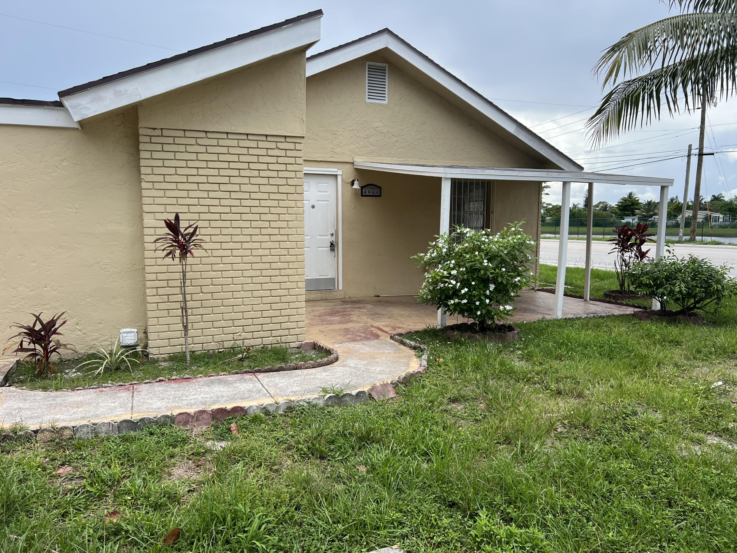 4988 Ohio Road Lake Worth, FL 33463 - Photo 2 of 14 IMG_4719