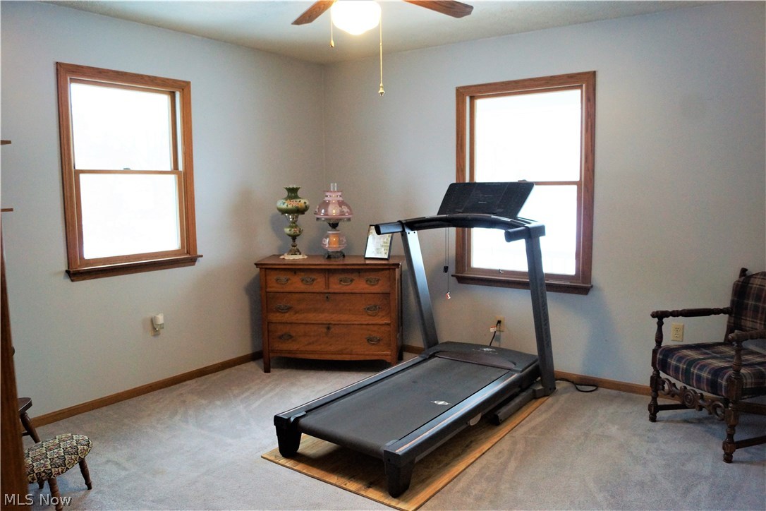 11044 Walker Road Minerva, OH 44657 - Photo 16 of 28 2ND BEDROOM HAS CARPET FLOORING, DOUBLE CLOSET AND 2 WINDOWS FOR GREAT LIGHT!