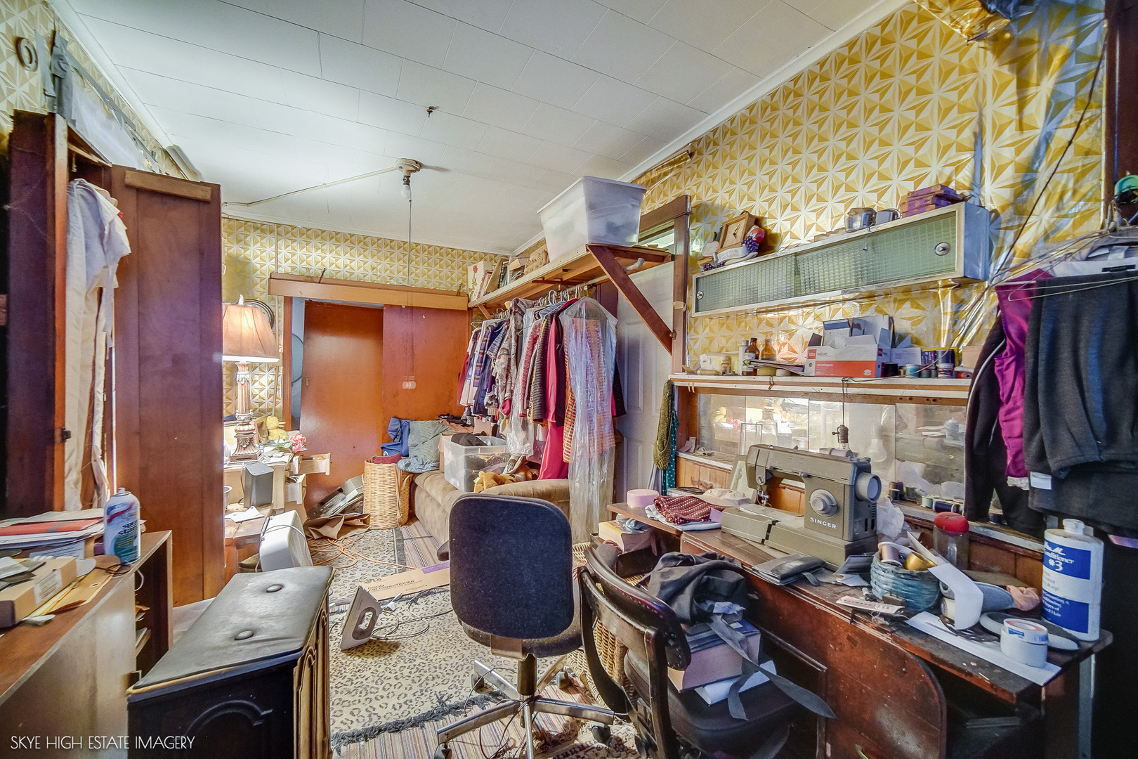 2016 West 51st Street Chicago, IL 60609 - Photo 4 of 14 a view of walk in closet with clothes and shoes