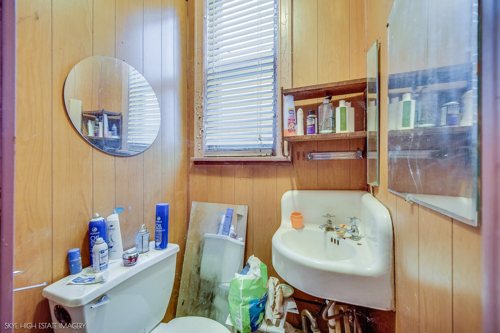 2016 West 51st Street Chicago, IL 60609 - Photo 9 of 14 a bathroom with a sink a mirror and a bathtub