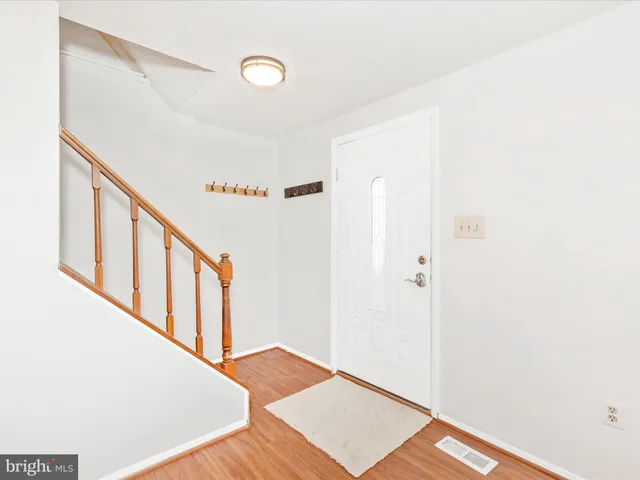 a view of a hallway with staircase