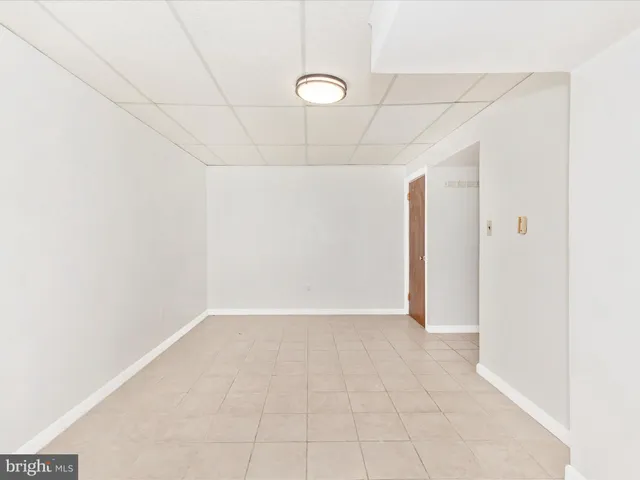 a view of a refrigerator in kitchen