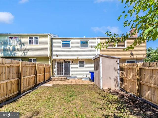 a view of a house with a door and a window