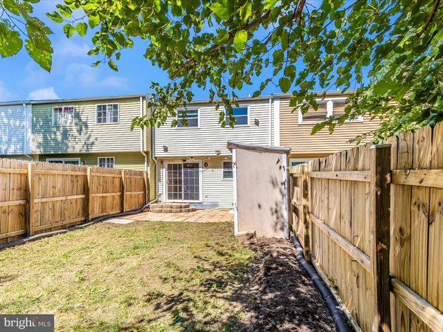 a view of a house with a door and a window