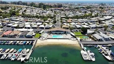 an aerial view of a chairs and table