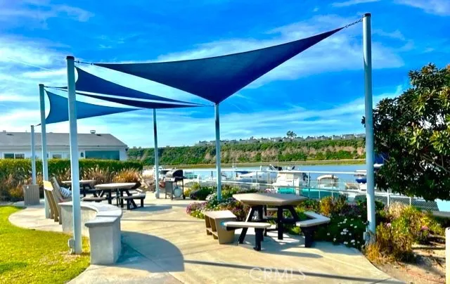 a view of an chairs and tables in the patio