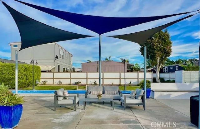 a view of a tables and chairs in patio
