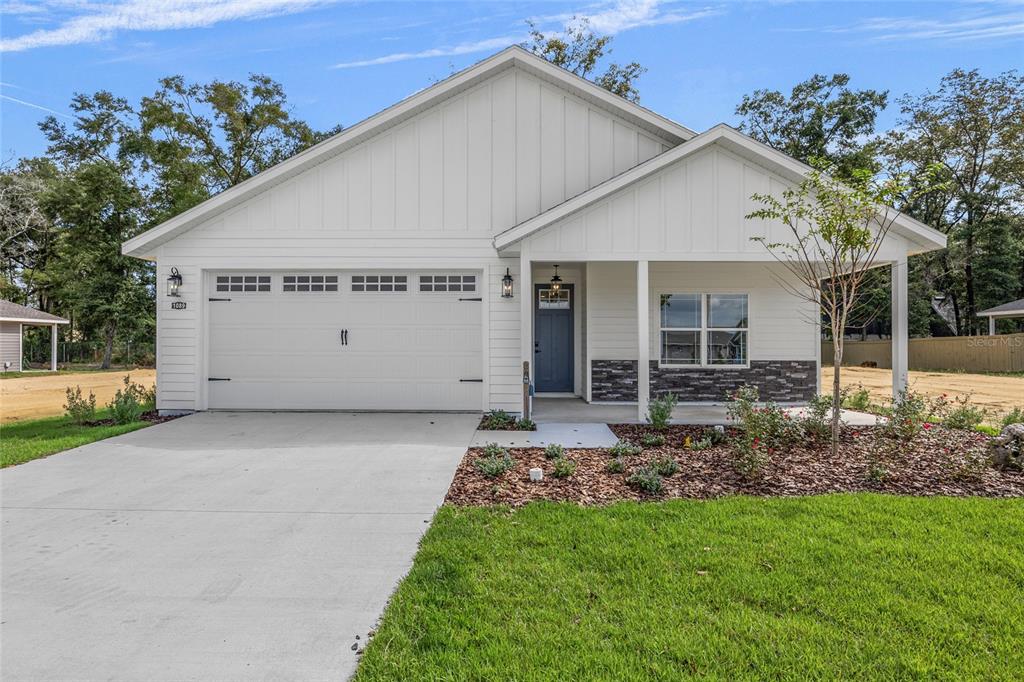 1089 Southwest 66th Terrace Gainesville, FL 32607 - Photo 1 of 1 a view of a house with a yard