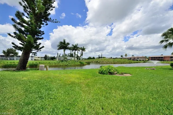 a view of a golf course with a lake
