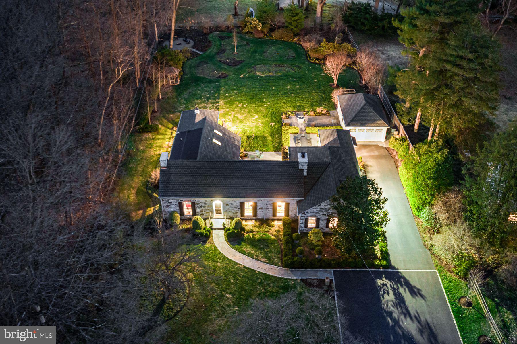 828 Black Rock Road Gladwyne, PA 19035 - Photo 11 of 68 an aerial view of house with yard swimming pool and outdoor seating