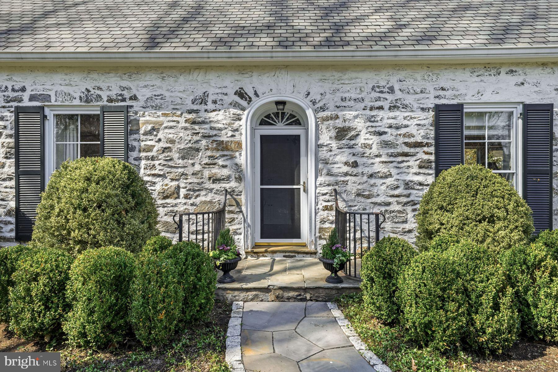 828 Black Rock Road Gladwyne, PA 19035 - Photo 13 of 68 a front view of a house with balcony