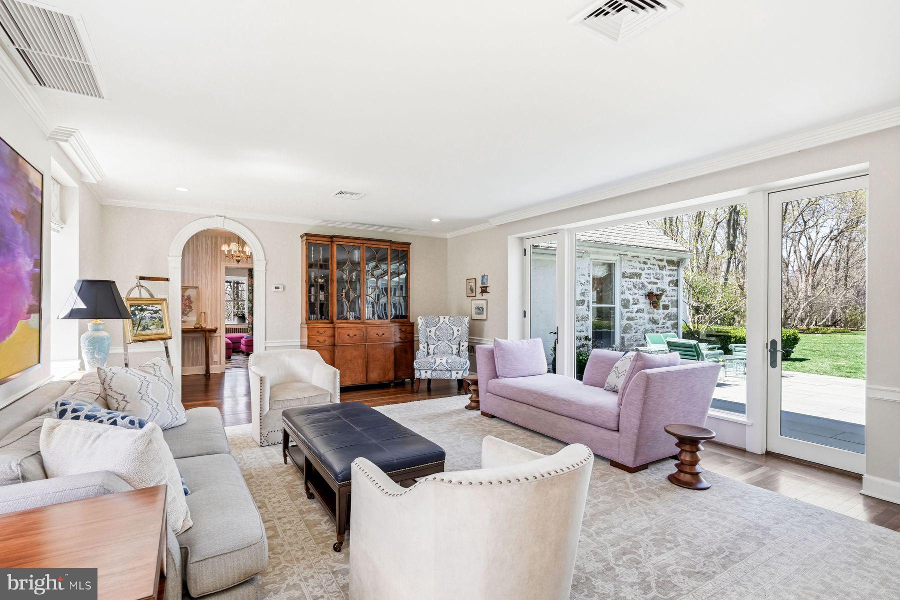 828 Black Rock Road Gladwyne, PA 19035 - Photo 18 of 68 a living room with furniture and a large window