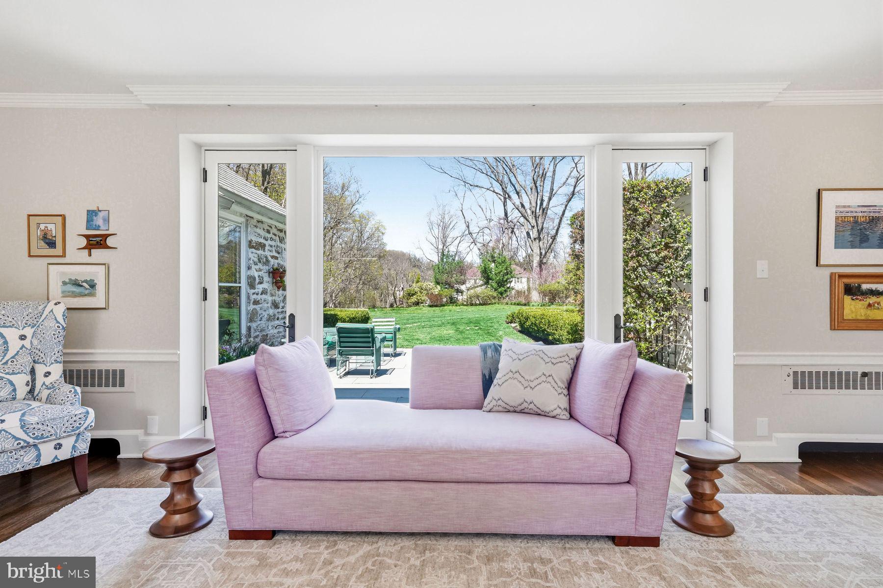 828 Black Rock Road Gladwyne, PA 19035 - Photo 19 of 68 a living room with furniture and a large window