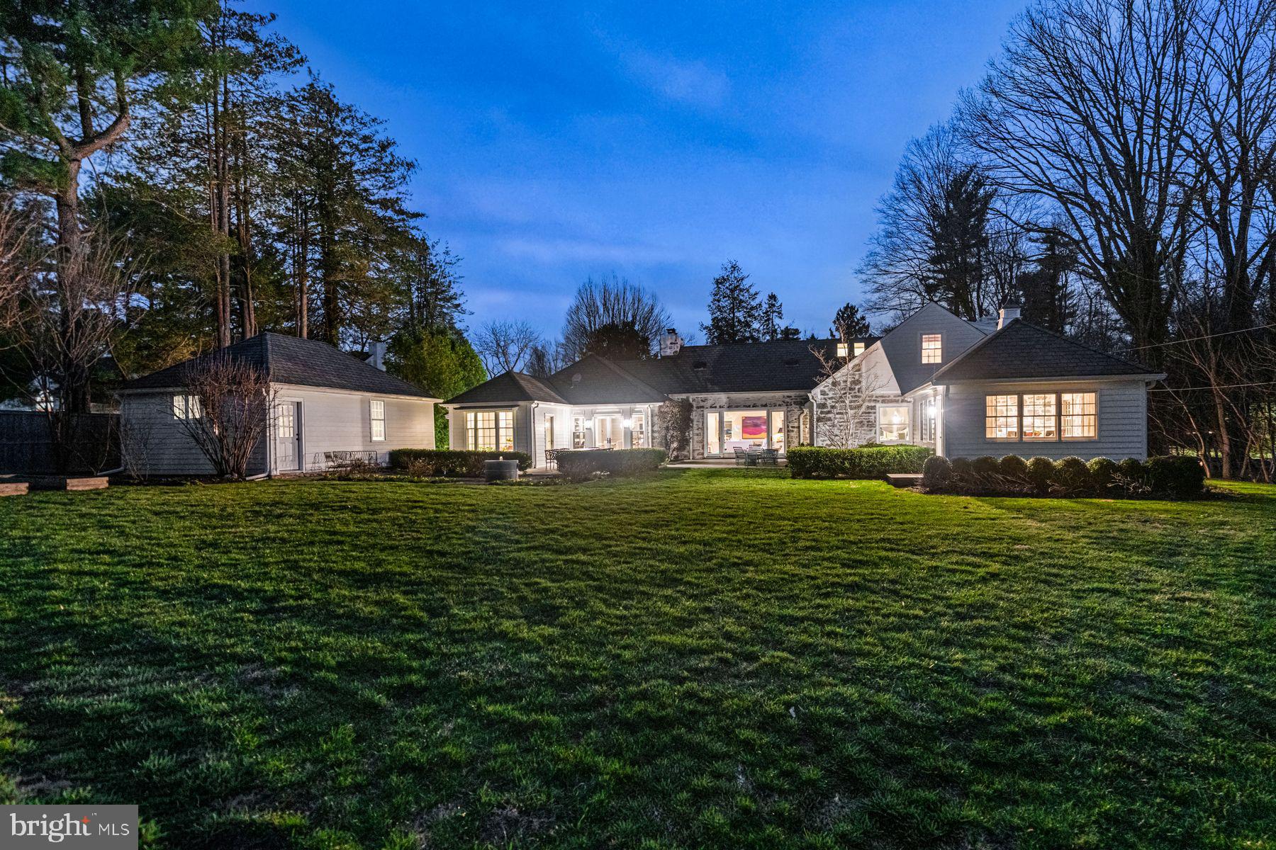 828 Black Rock Road Gladwyne, PA 19035 - Photo 2 of 68 a front view of a house with garden