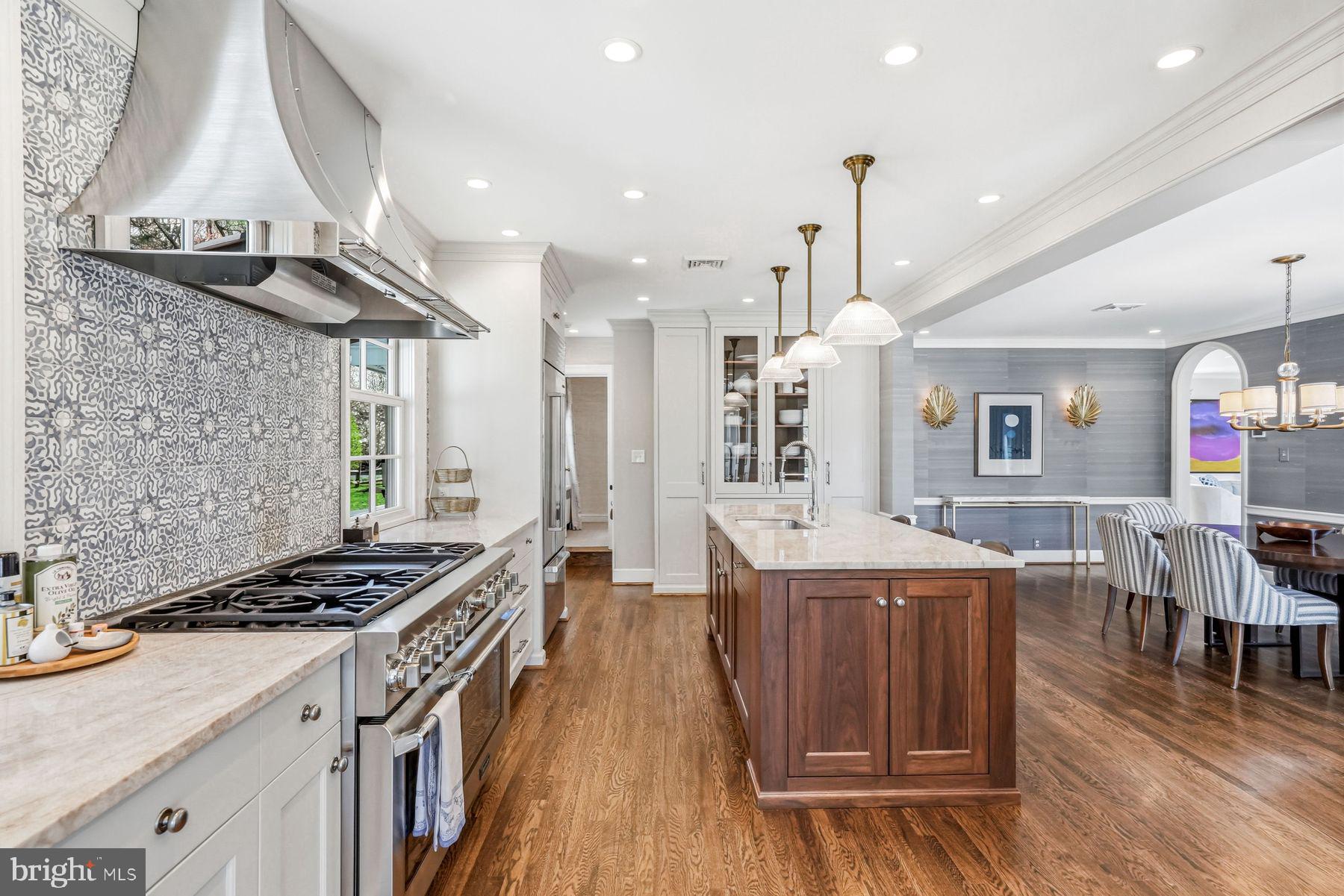 828 Black Rock Road Gladwyne, PA 19035 - Photo 28 of 68 a kitchen with stainless steel appliances granite countertop a stove and a wooden floors