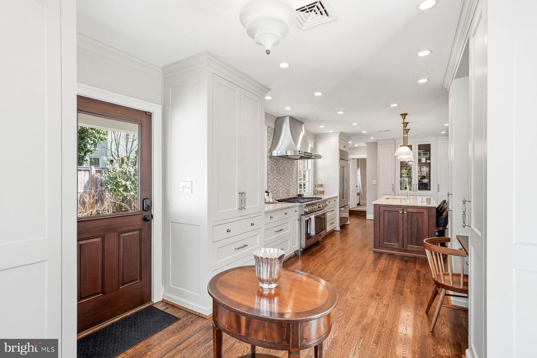 828 Black Rock Road Gladwyne, PA 19035 - Photo 33 of 68 a dining room with furniture and a chandelier
