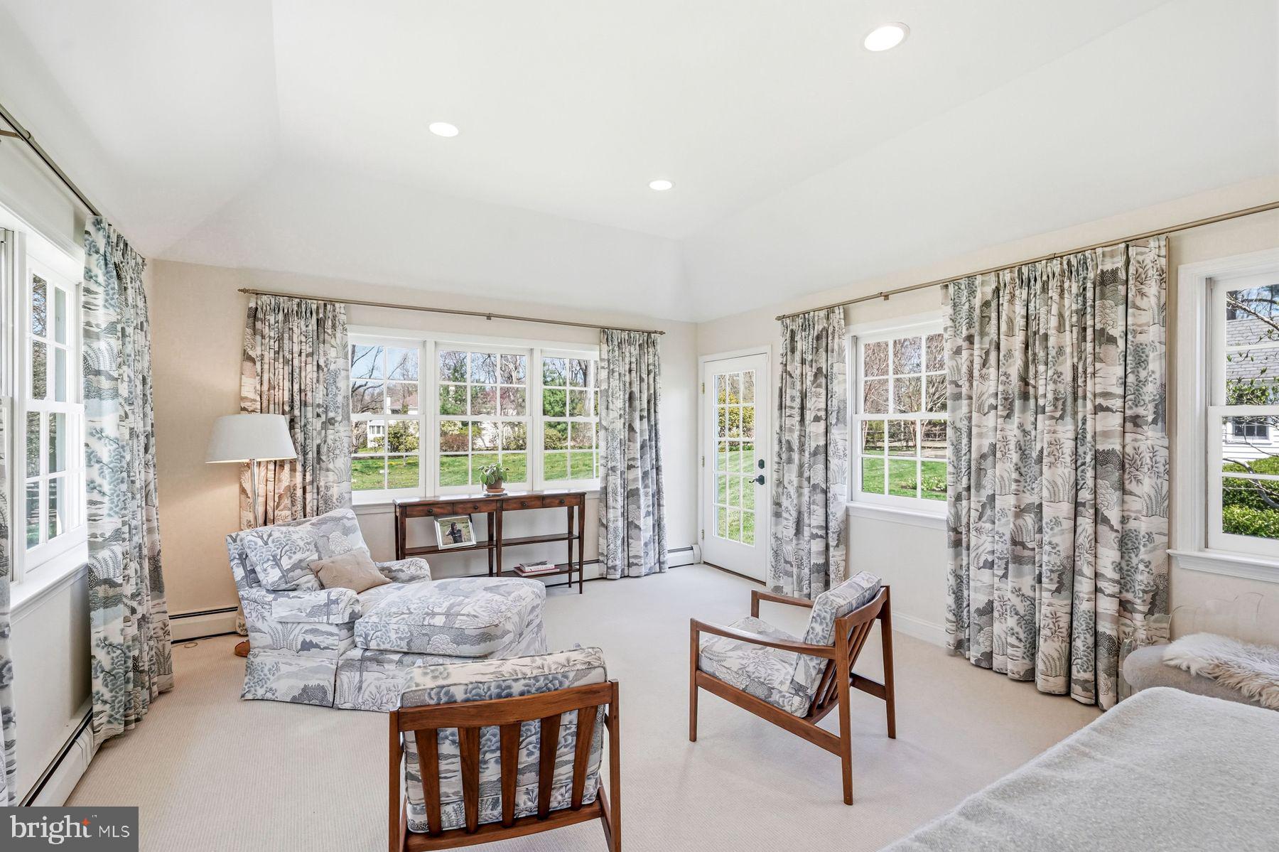 828 Black Rock Road Gladwyne, PA 19035 - Photo 36 of 68 a living room with furniture and a large window