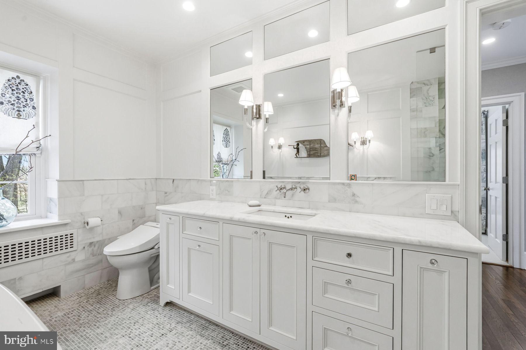 828 Black Rock Road Gladwyne, PA 19035 - Photo 39 of 68 a bathroom with a sink toilet and shower