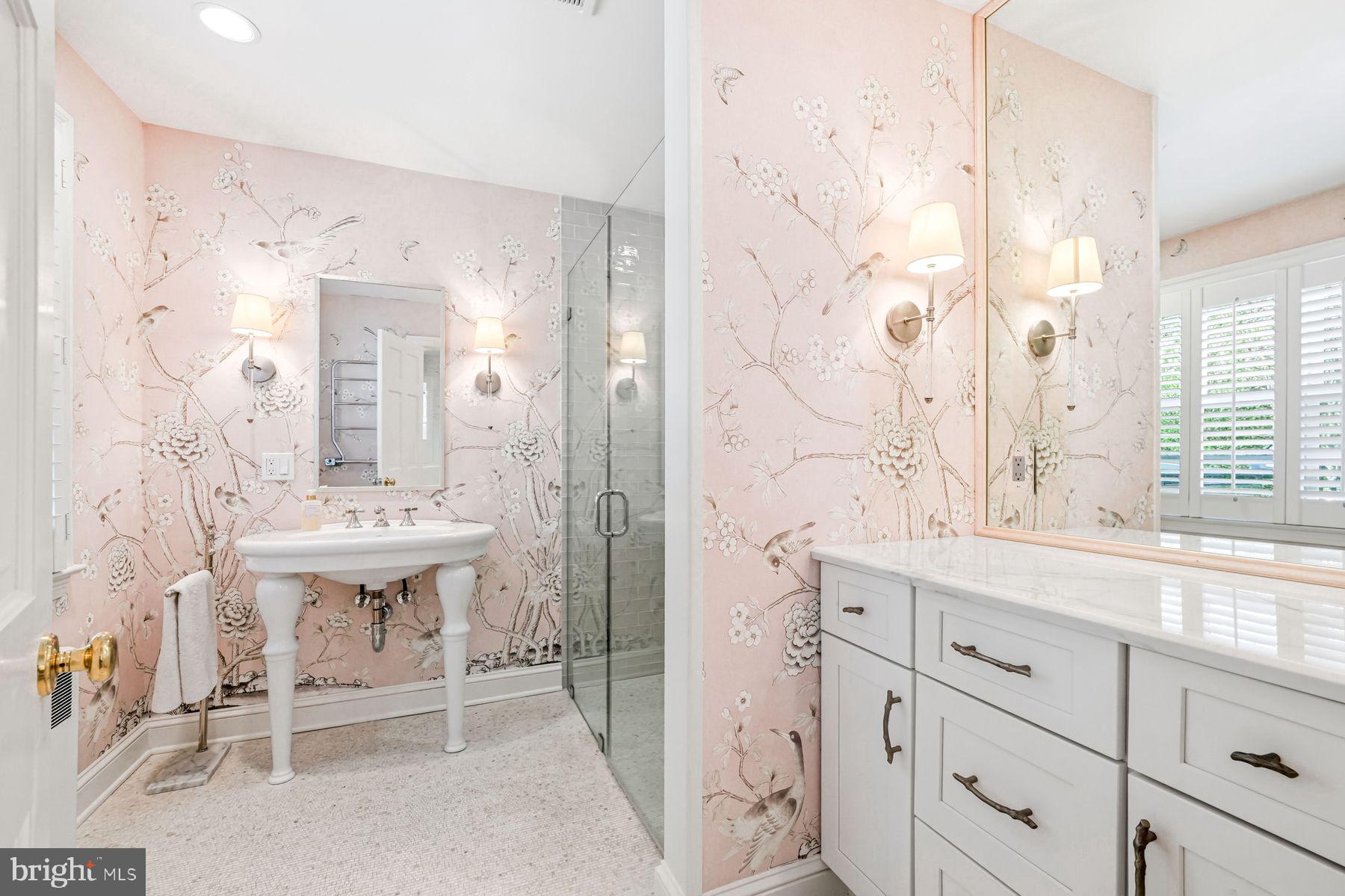 828 Black Rock Road Gladwyne, PA 19035 - Photo 49 of 68 a spacious bathroom with a sink and a mirror