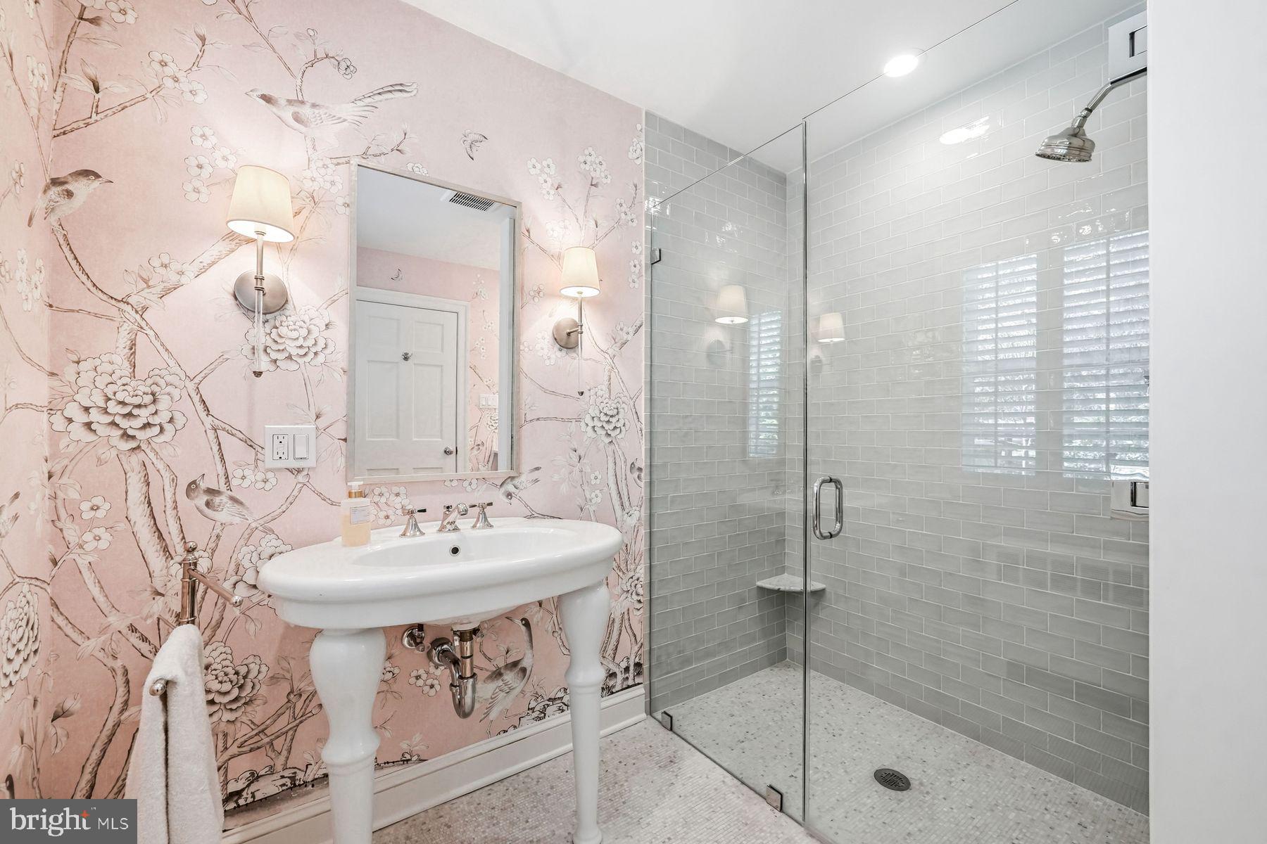 828 Black Rock Road Gladwyne, PA 19035 - Photo 50 of 68 a bathroom with a sink shower and a mirror