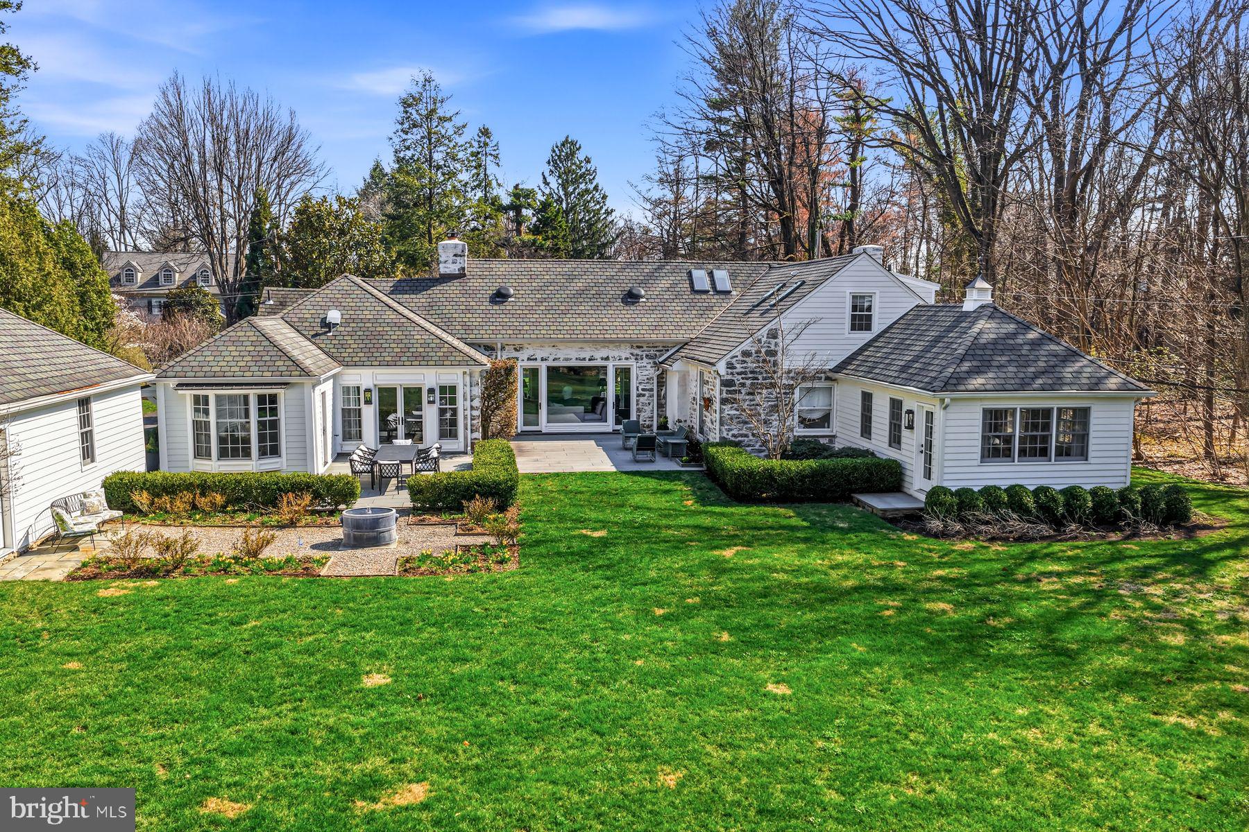 828 Black Rock Road Gladwyne, PA 19035 - Photo 60 of 68 a front view of a house with yard and green space
