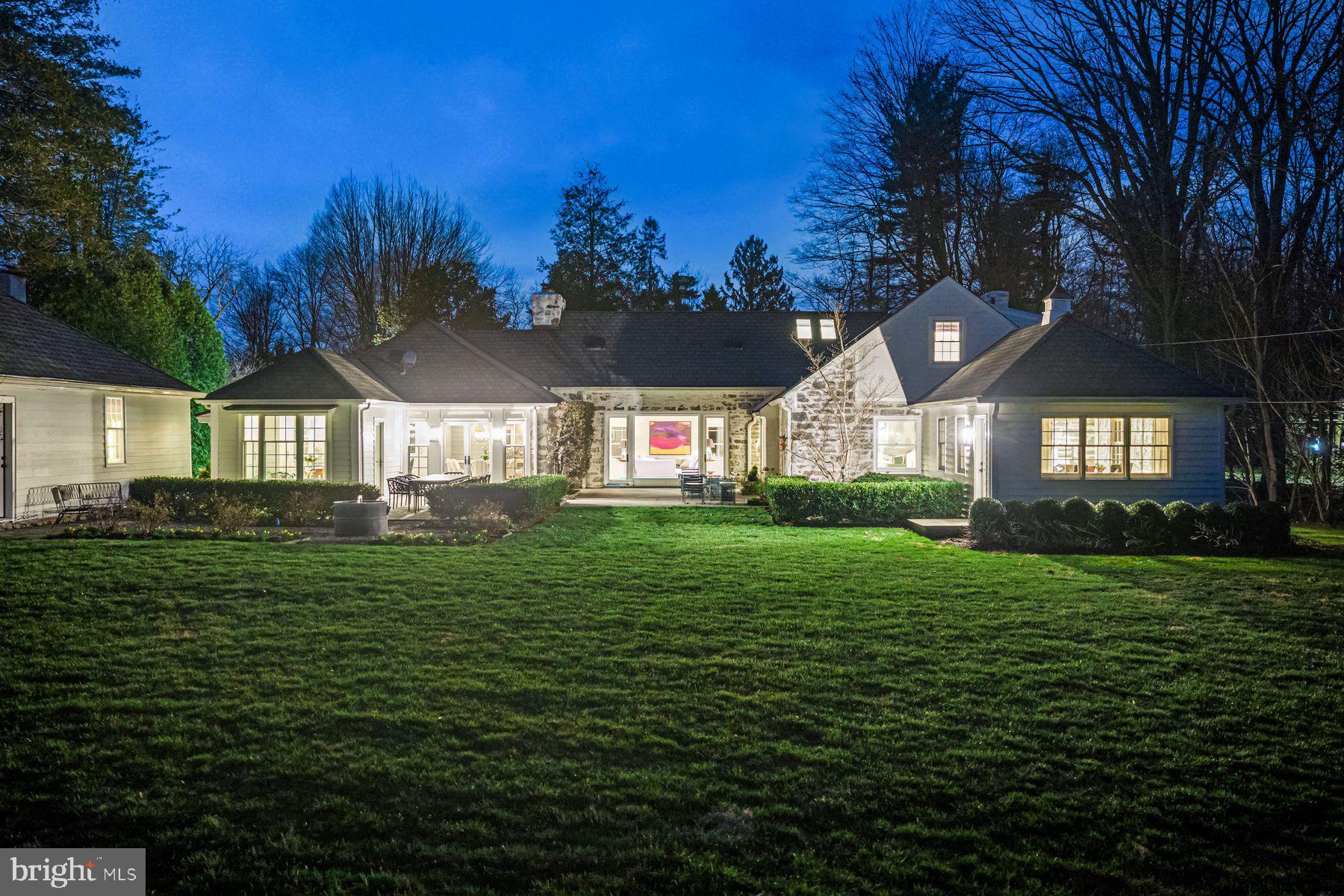 828 Black Rock Road Gladwyne, PA 19035 - Photo 9 of 68 a front view of a house with a yard
