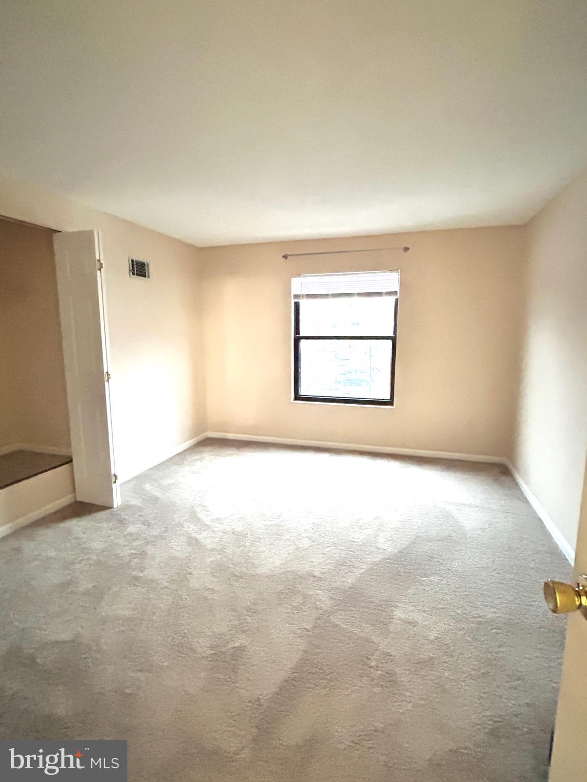 803 J Stratford Way, Unit 1100J Frederick, MD 21701 - Photo 16 of 16 an empty room with a empty space and windows